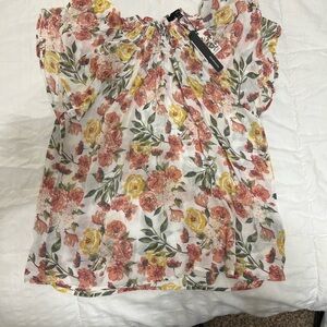 New with tag. Women’s blouse/top. Floral